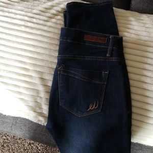 Express dark wash skinny jeans